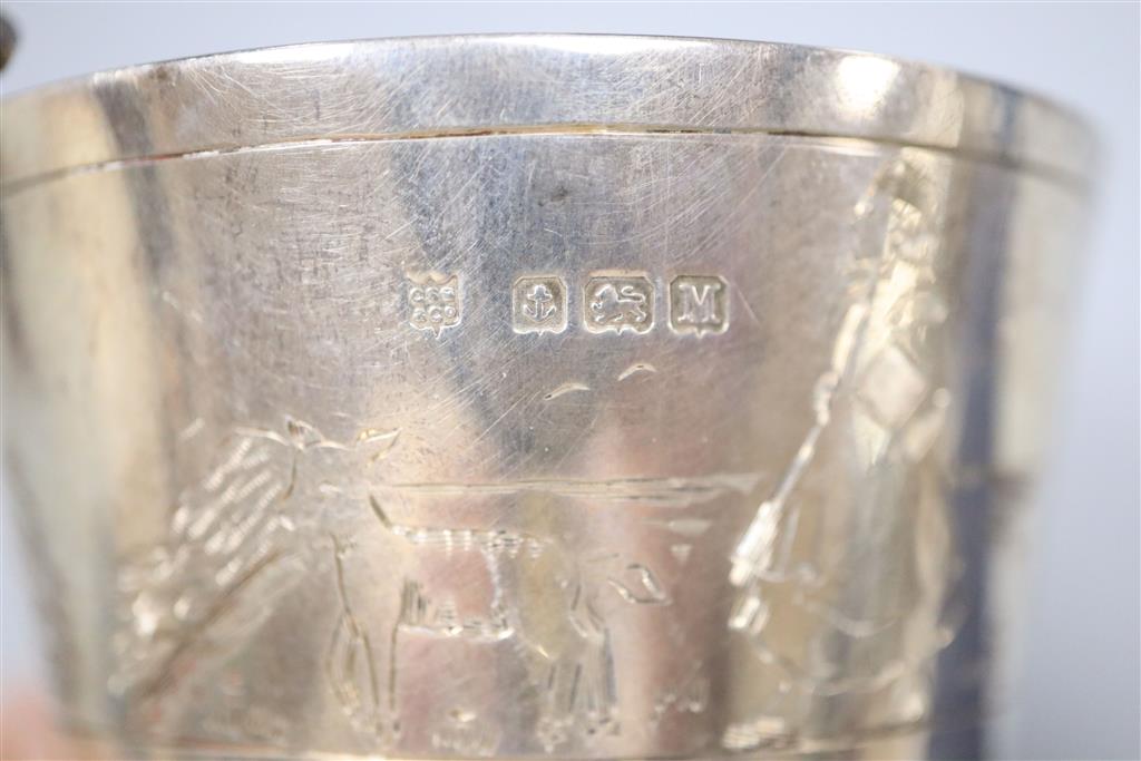 A 1930s Art Deco silver christening mug with dogs head handle and engraved with Little Bo Peep & 3 curling stones.